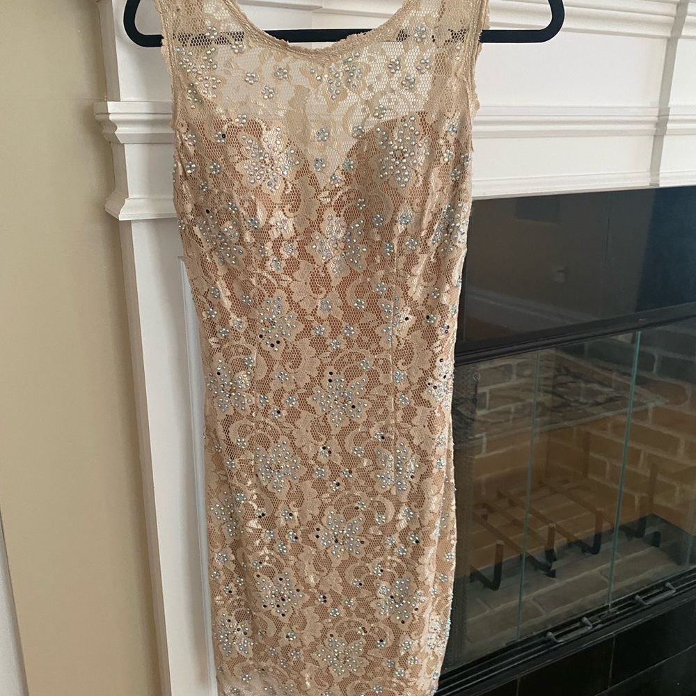 Beautiful, formal crystal champagne size 8 Jovani  sleeveless backless dress.
